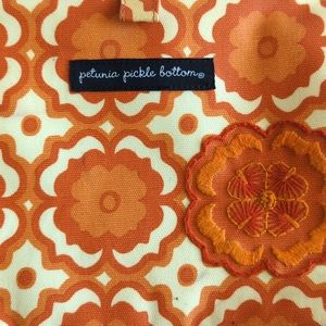 Petunia Pickle Bottom Baby Crosstown Orange Floral Diaper Bag Clutch Purse